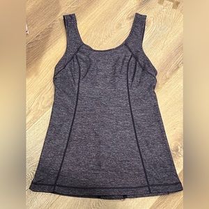 Lululemon Purple Ruffle Back Tank with zippered side pocket w logo charm size 6